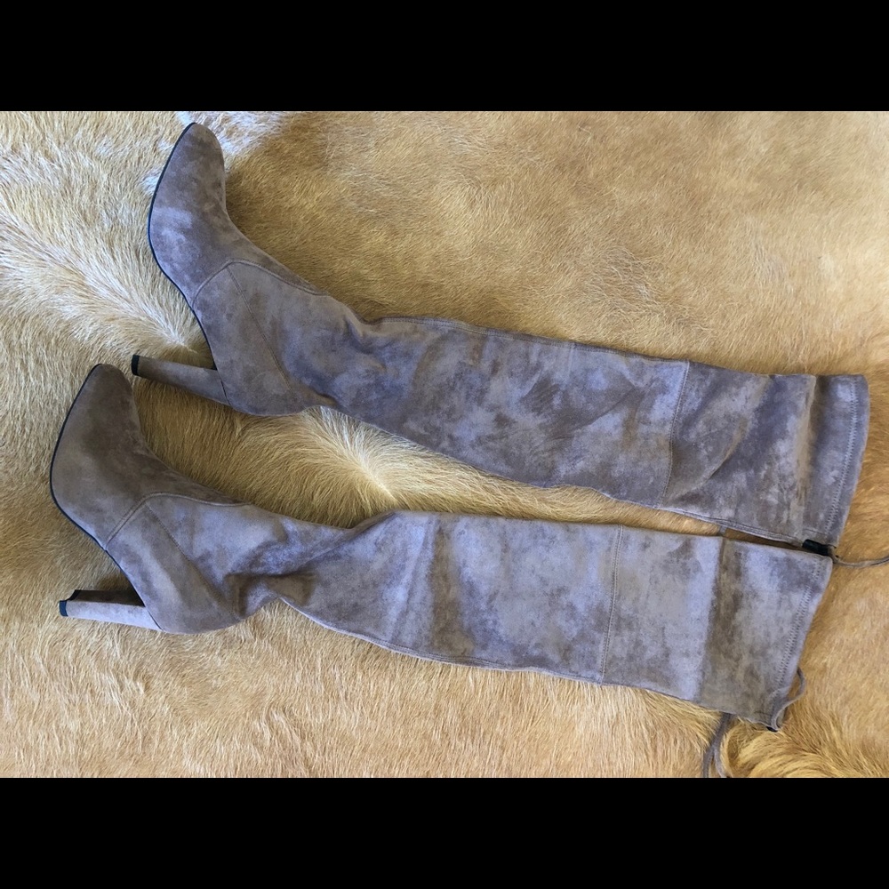 Thigh high heeled boots